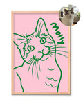Framed illustration of a cat named 'Molly' on a pink background and green line illustration