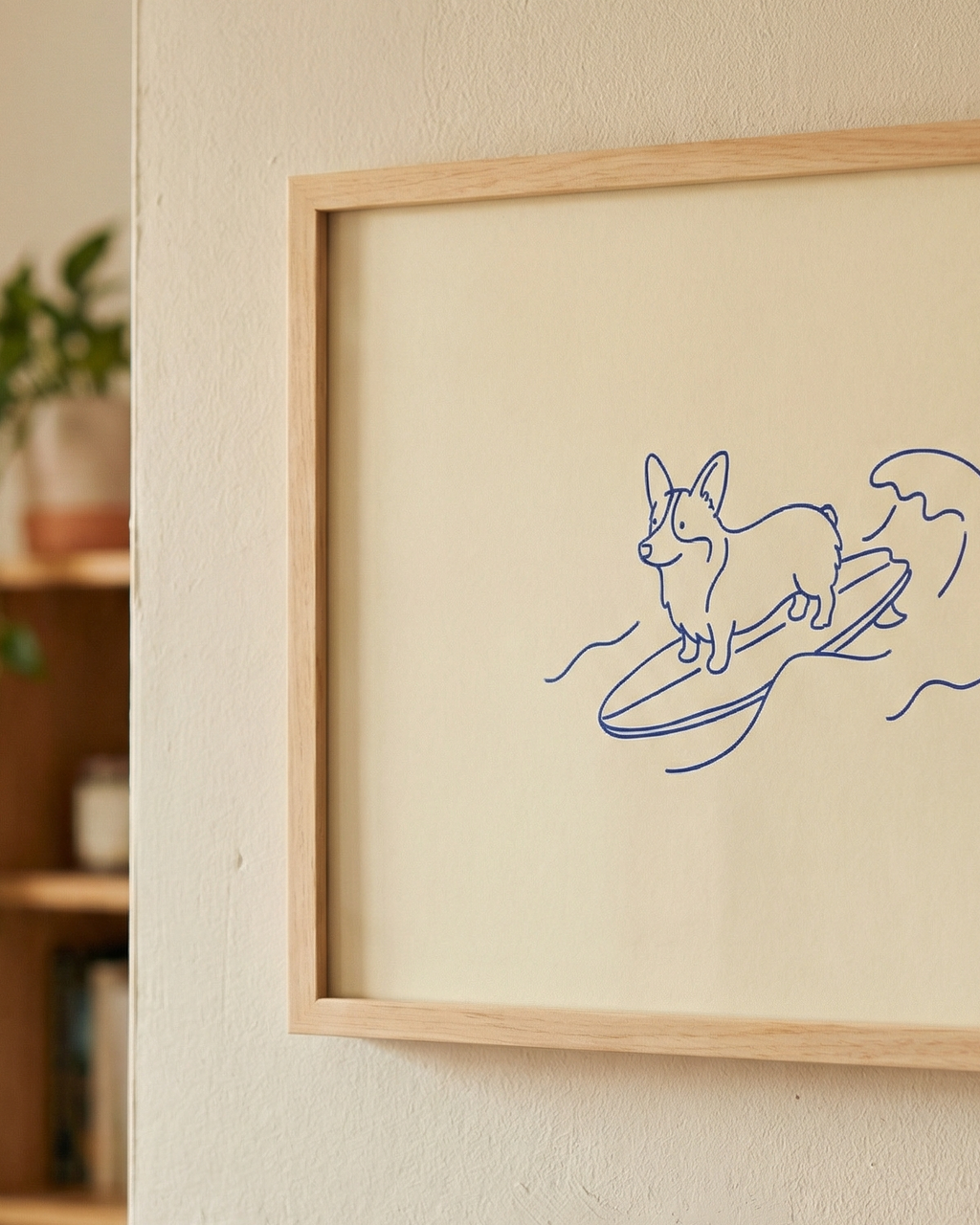 Framed artwork of a dog surfing on a wave with a wooden frame.