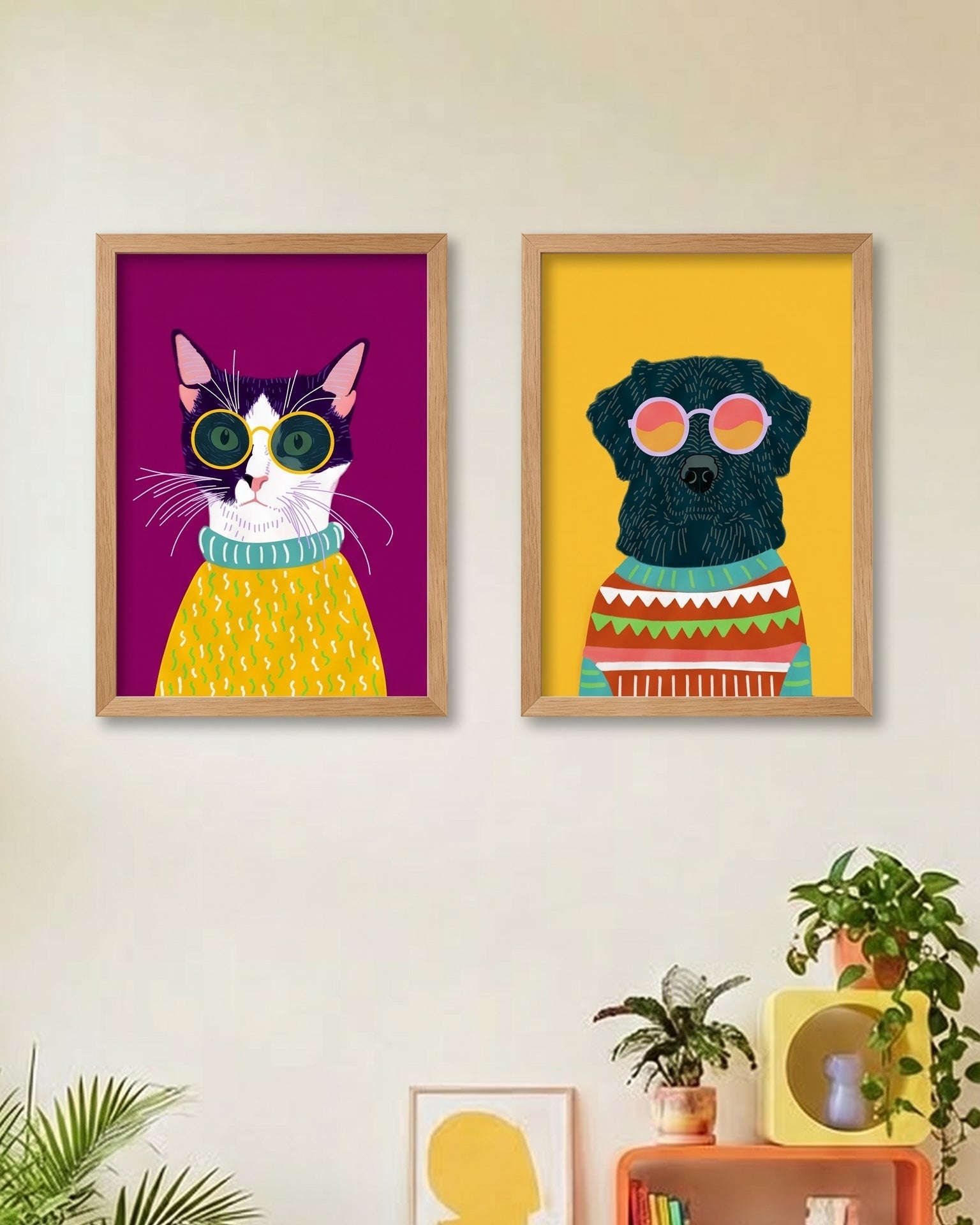 Colorful framed cat and dog prints on a wall with a modern living room setup.
